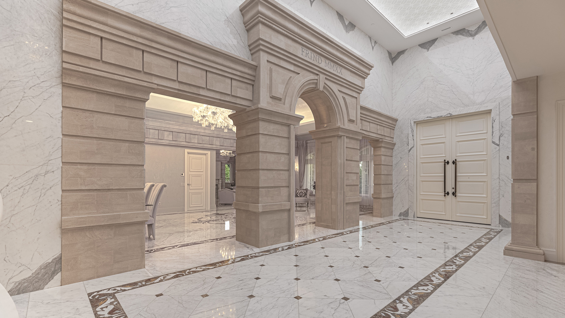 Altamont's Muse grand foyer with carved limestone archway and Calacatta marble walls in West Vancouver