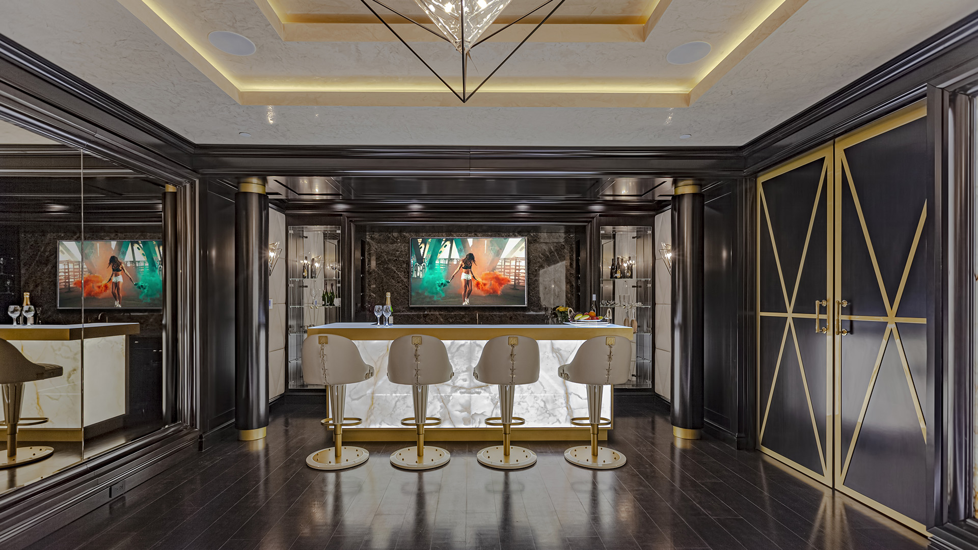 Altamont's Muse cocktail bar with marble counter and gold accents in West Vancouver