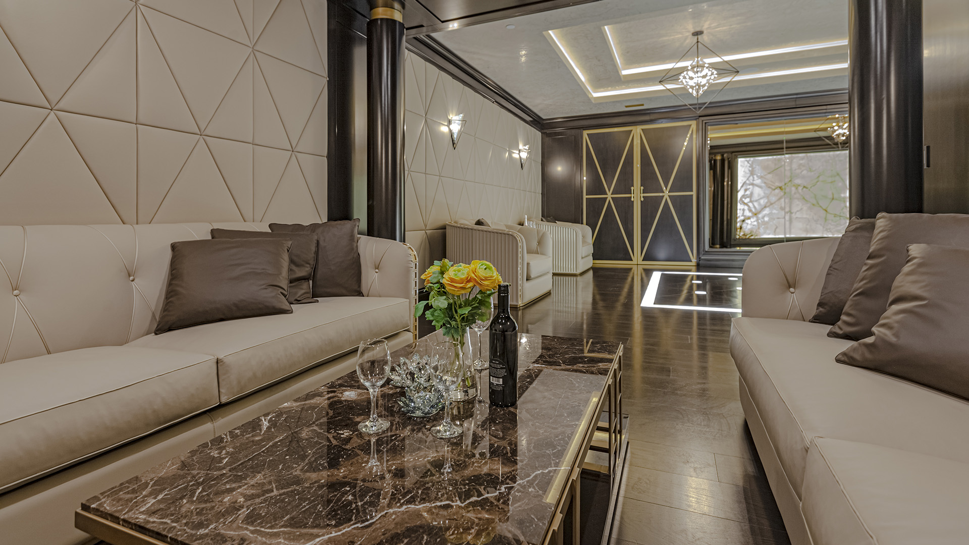 Altamont's Muse VIP lounge with geometric walls and marble table in West Vancouver