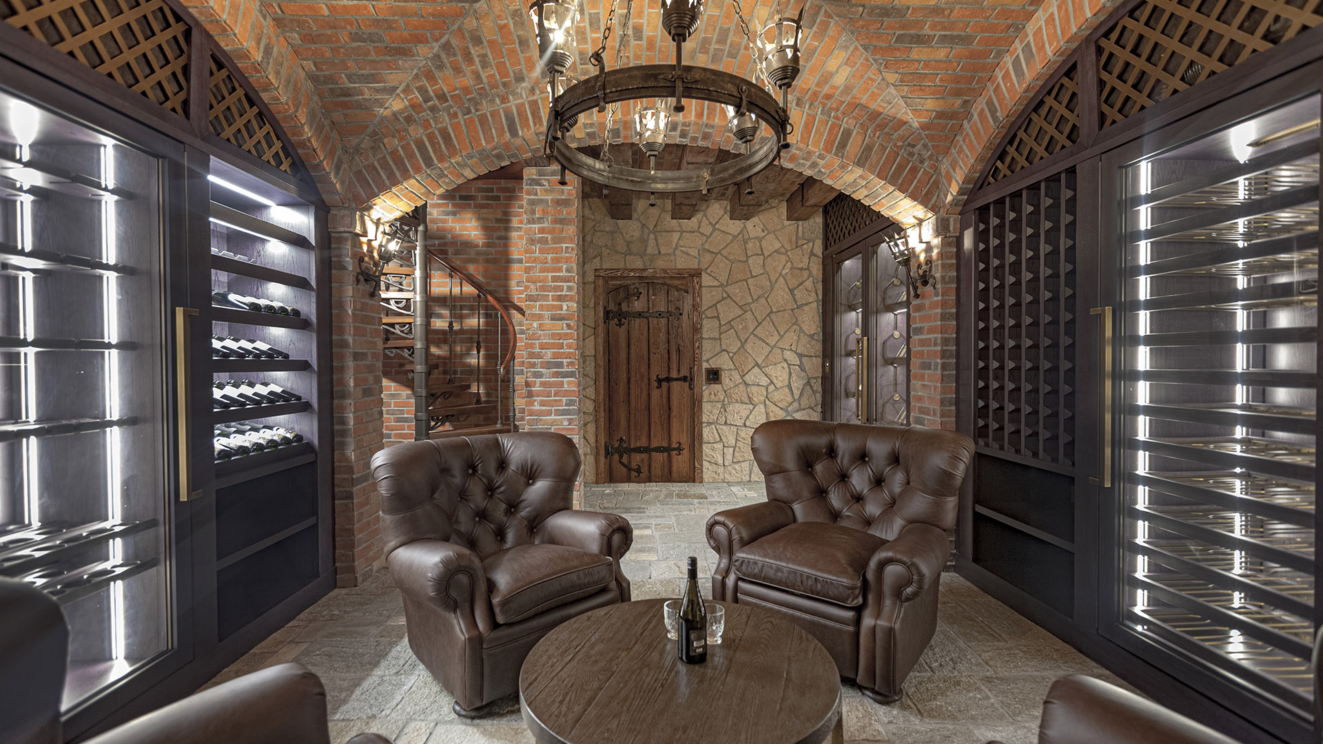 Altamont's Muse wine cellar with spiral staircase and climate-controlled storage in West Vancouver