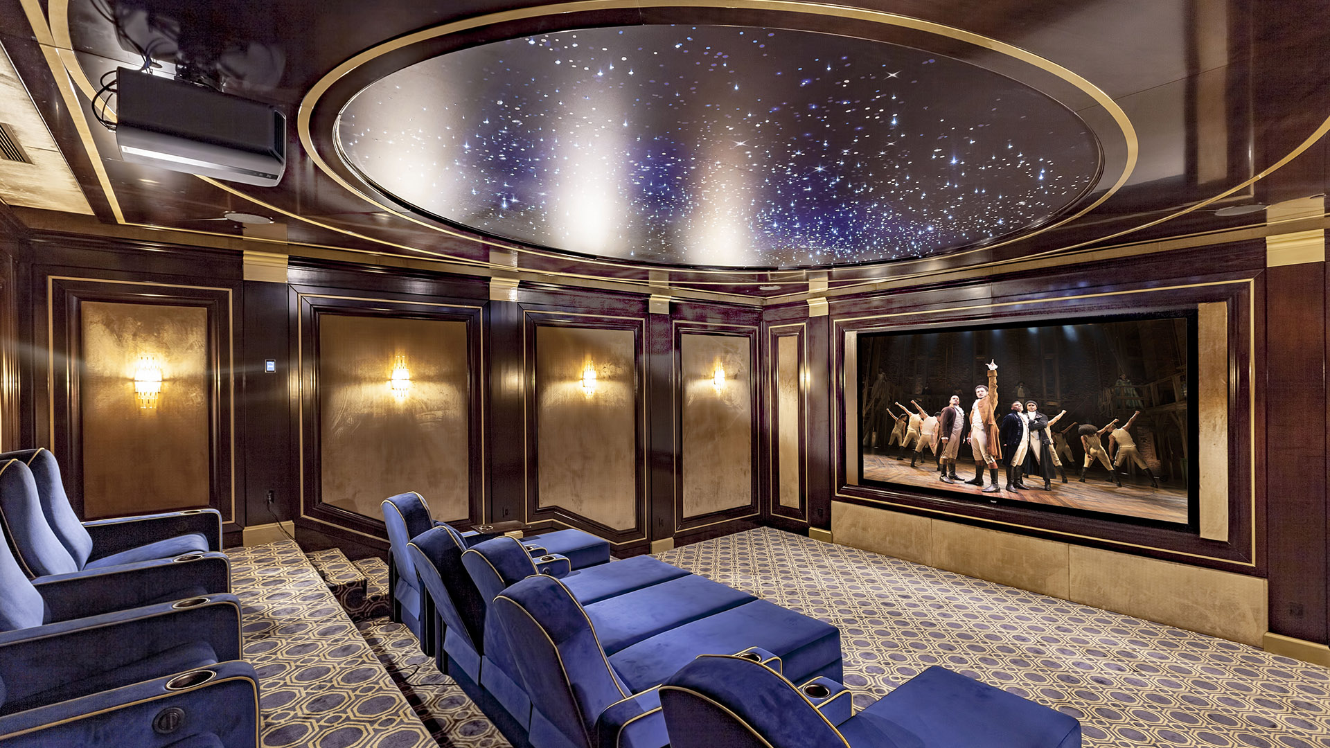 Altamont's Muse theatre alternate view with projection screen and gilded panels in West Vancouver