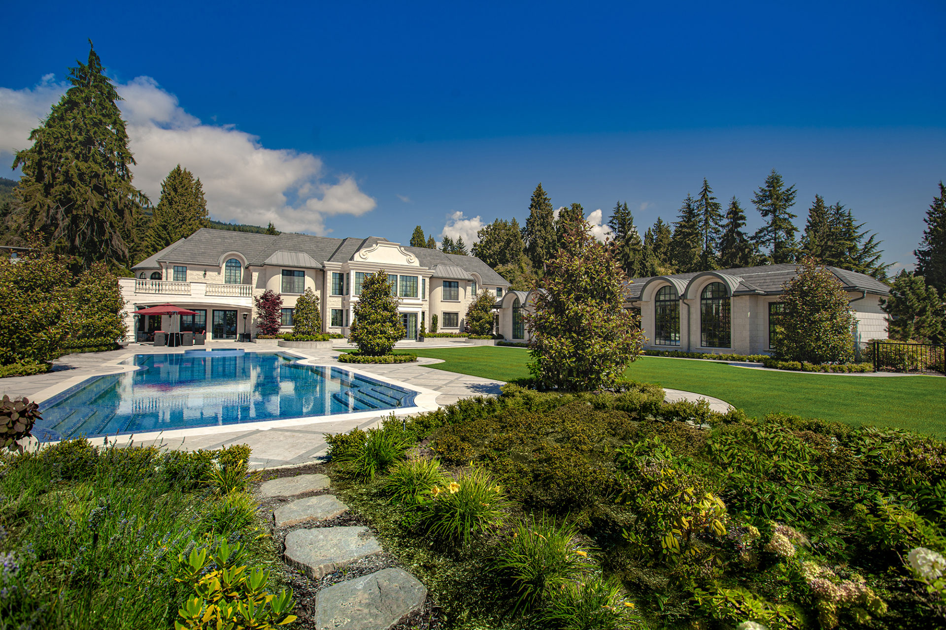 Ambleside Palace West Vancouver estate grounds with pool pavilion and professional landscaping