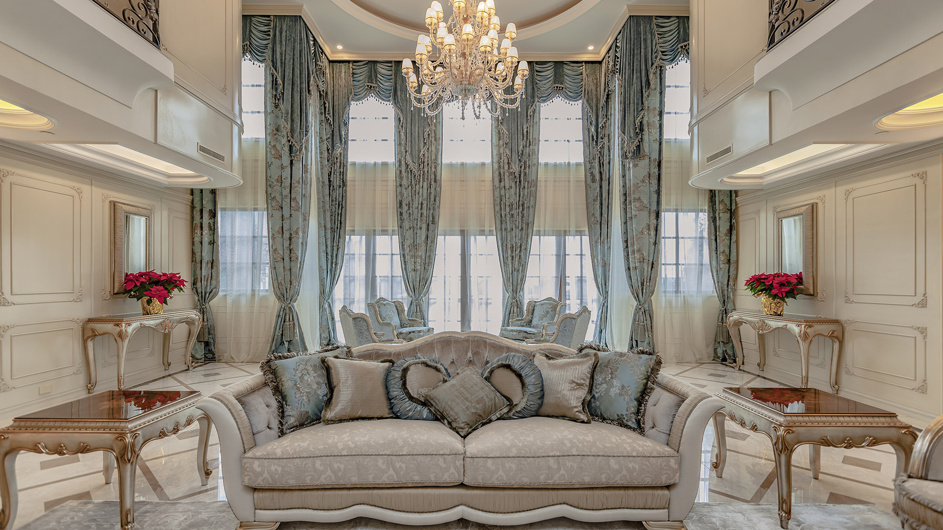 Ambleside Palace double-height formal living room with crystal chandelier and silk drapery in West Vancouver