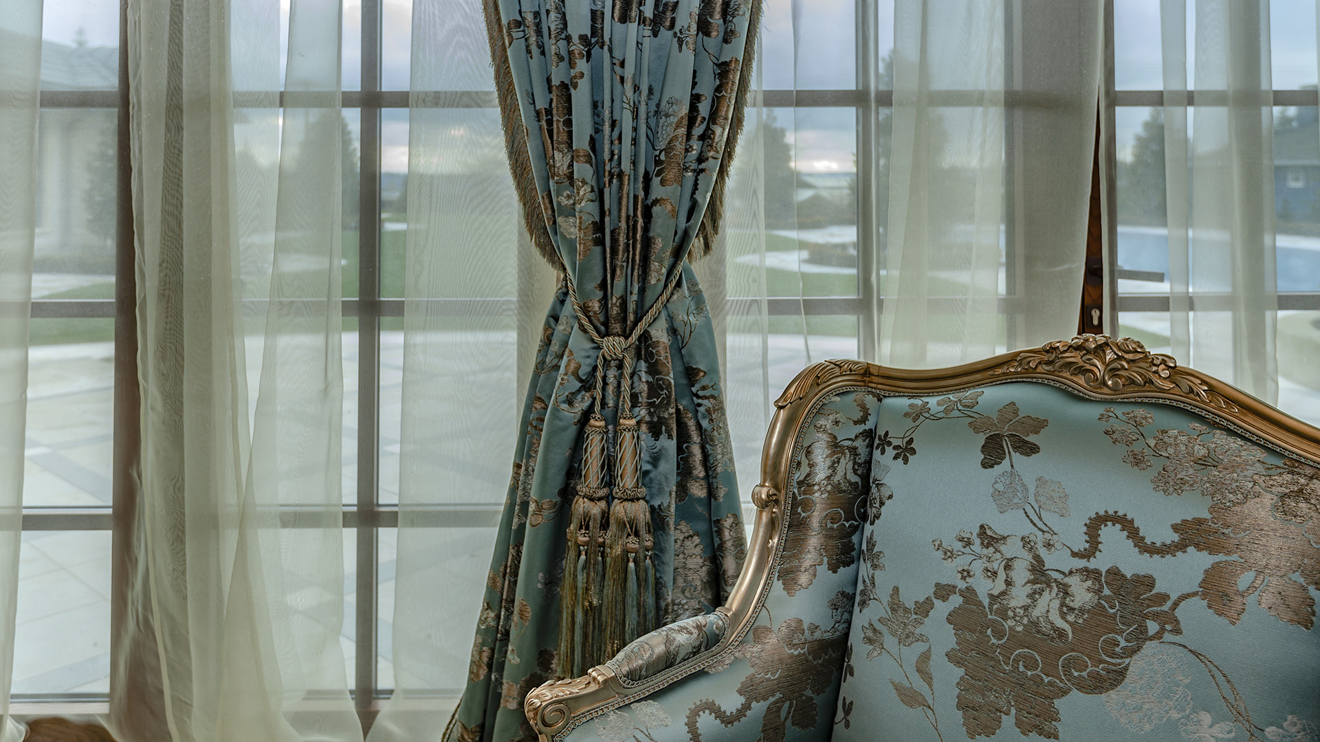 Ambleside Palace interior detail of hand-tied silk drapery tassel and damask upholstery in West Vancouver