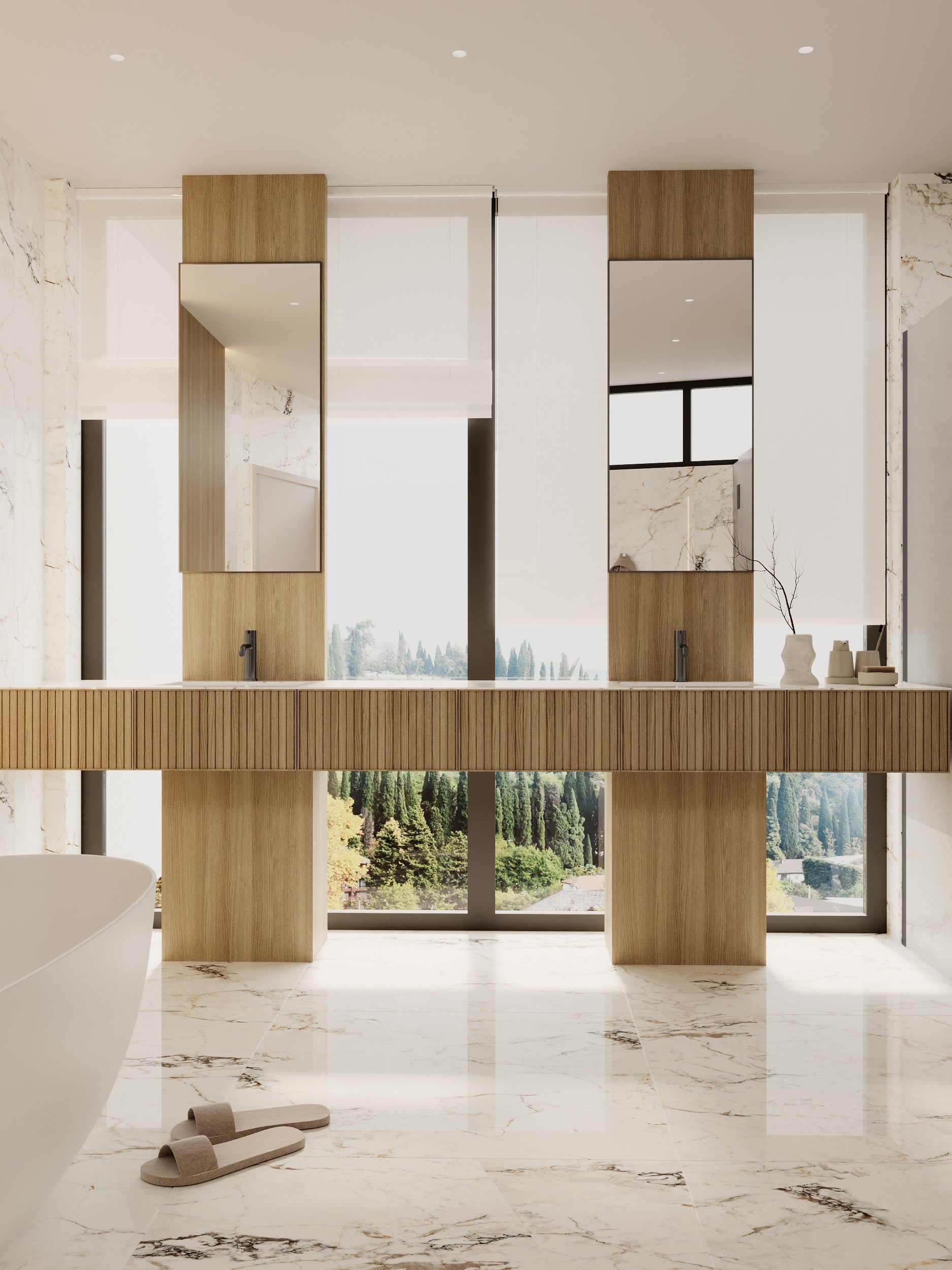 Master bathroom with dual oak vanity towers and book-matched marble at Benbow Road West Vancouver by Eurohouse Studio