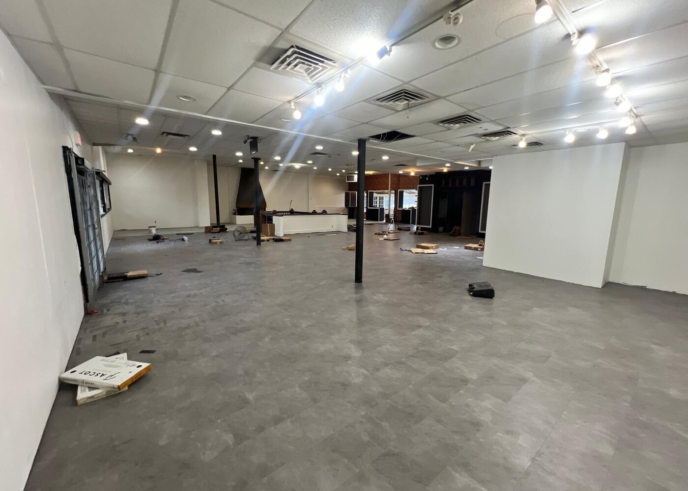 Commercial water damage restoration — completed retail space on West Broadway Vancouver
