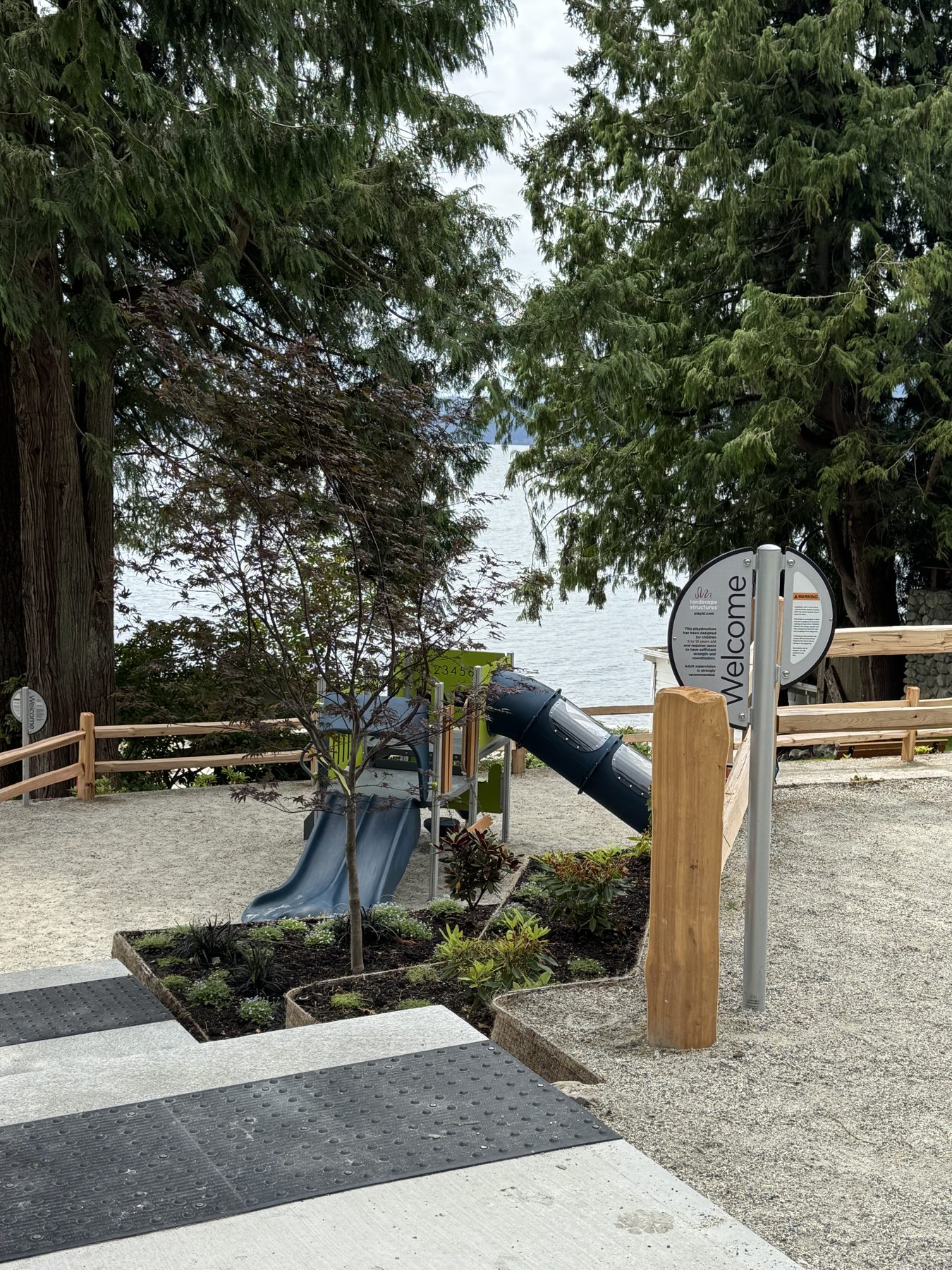 Welcome sign, accessible pathway and new planting at Lions Bay Beach Park