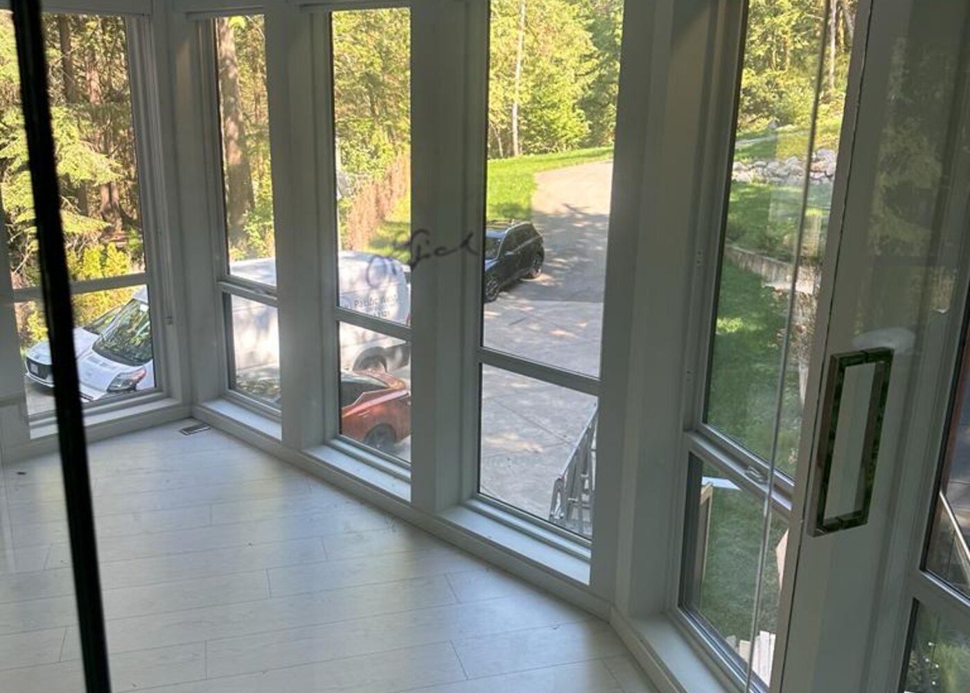 Lower level carpeted staircase before insurance restoration at Prospect Road North Vancouver