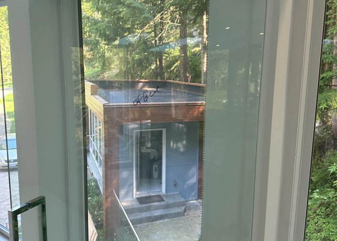 Lower level staircase view before water damage restoration at Prospect Road North Vancouver