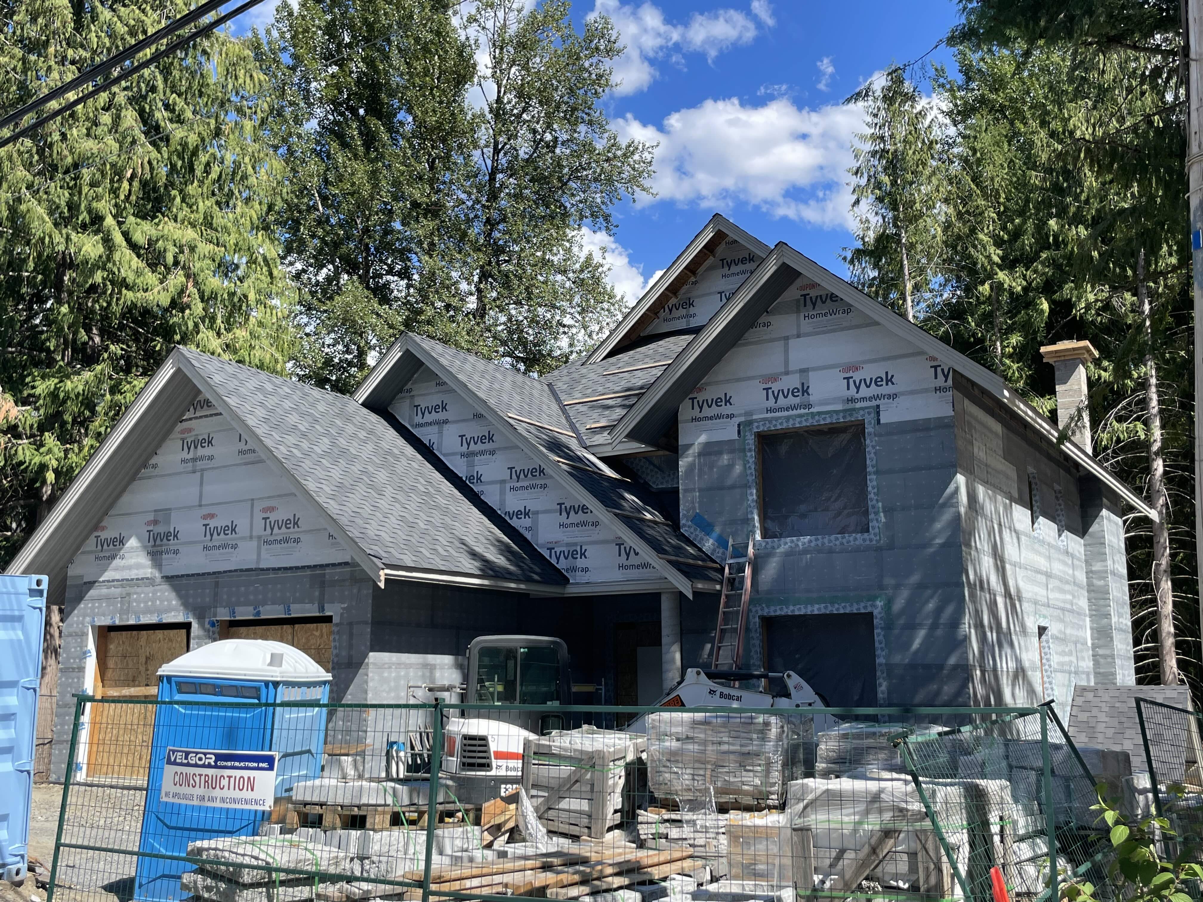 Framing and ICF construction progress showing gabled rooflines at Rainbow in Whistler by Eurohouse Construction