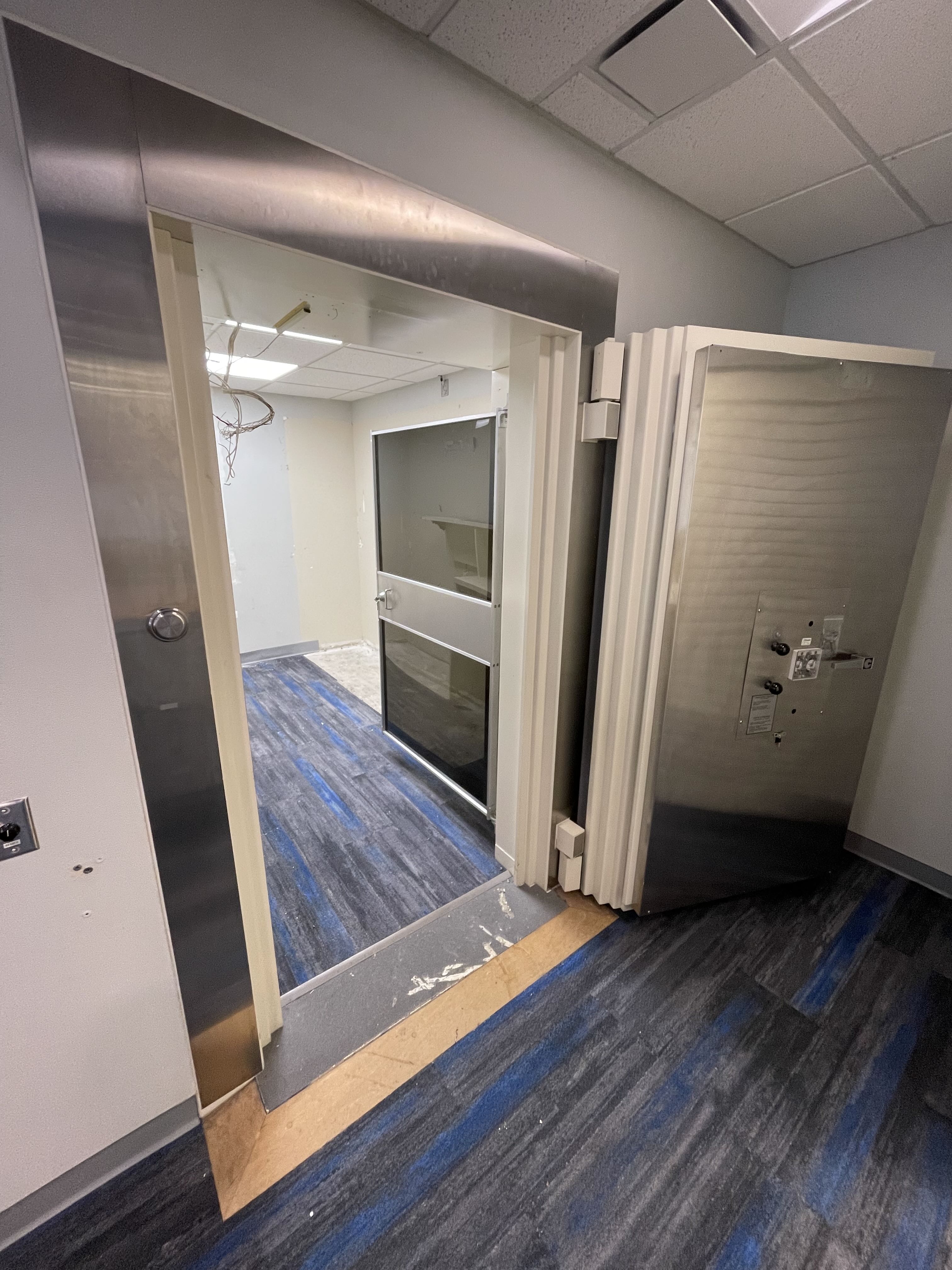 Existing bank vault preserved during Rennie office renovation West Vancouver