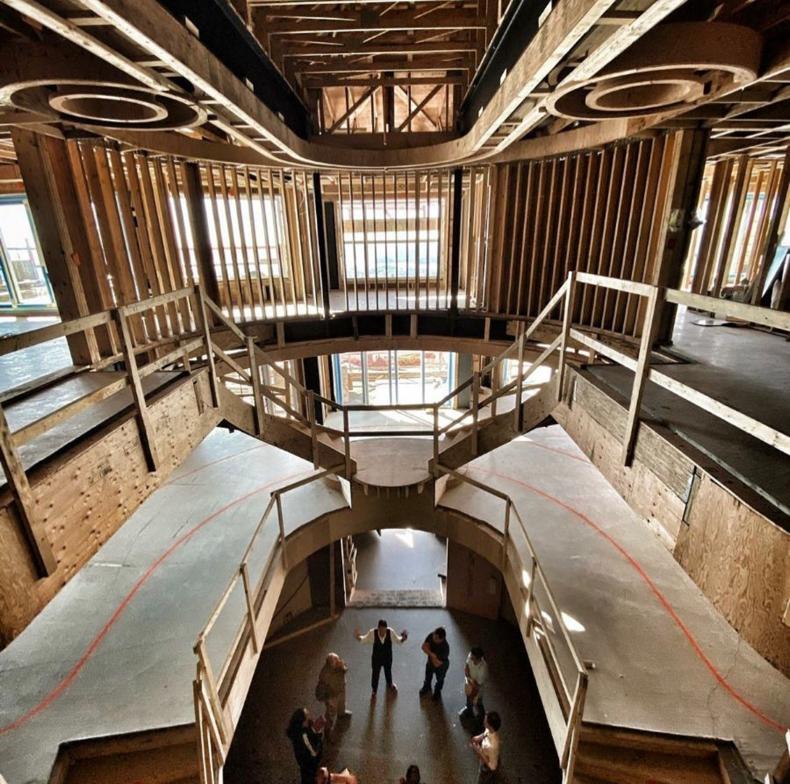 Complex curved framing at The H House West Vancouver — design-build coordination ensures constructability by Eurohouse Construction